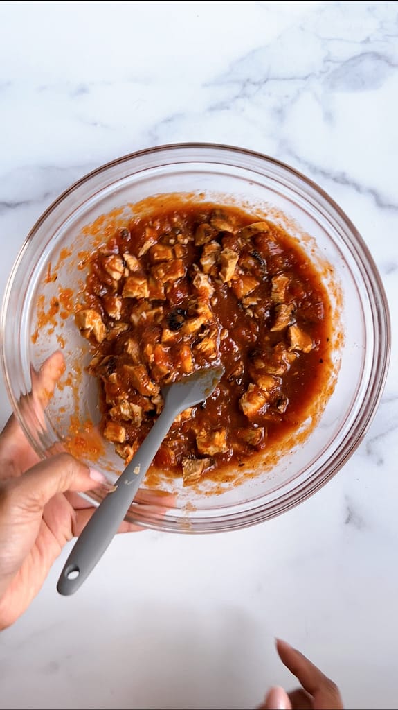 grilled chicken coated in salsa