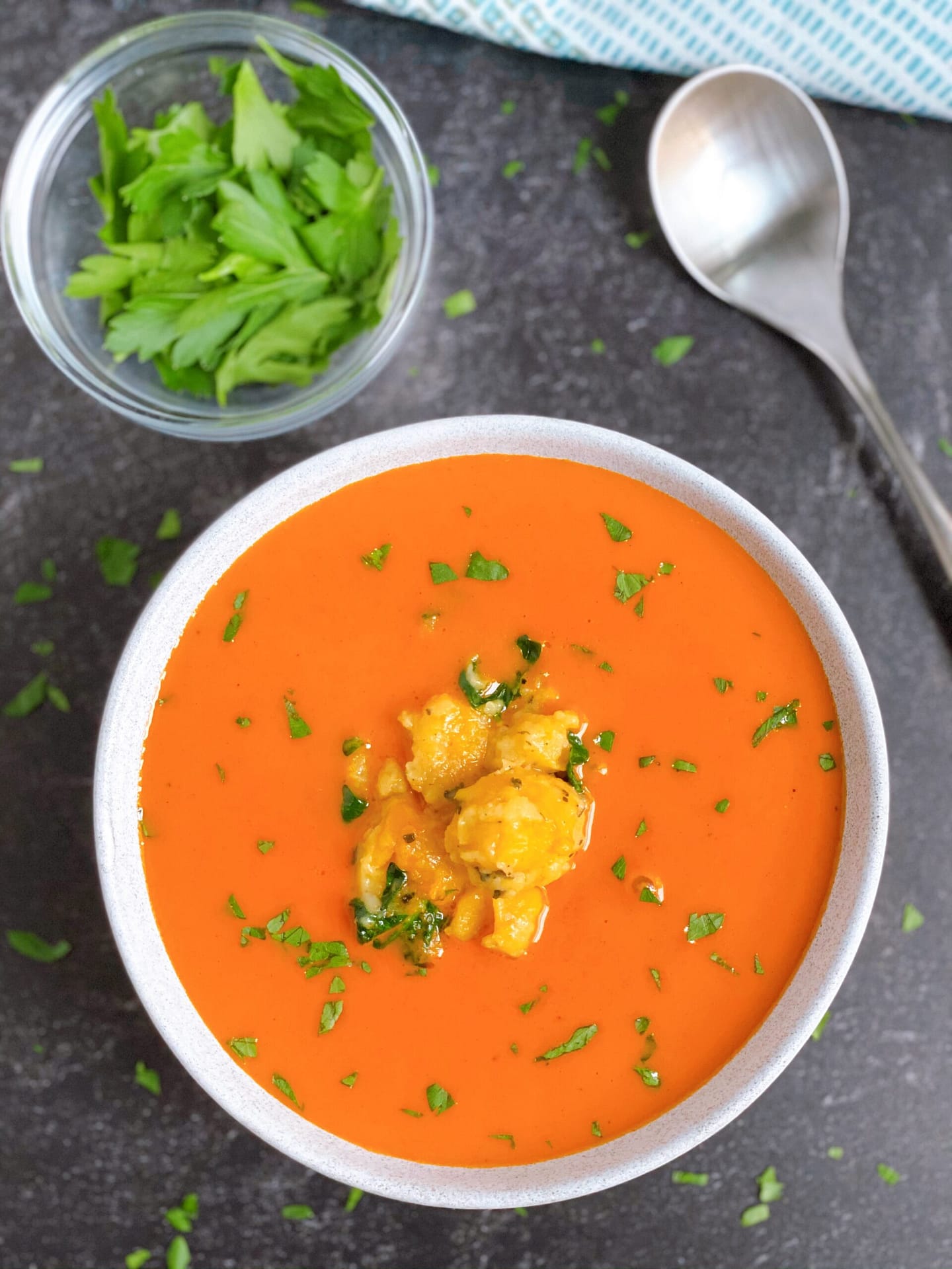 A bowl of Butter & Sage Sweet Potato Gnocchi with Tomato Soup